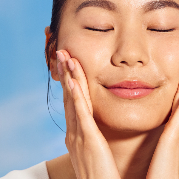 Woman Massaging Face